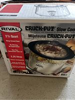 Photo of Rival Crock-Pot slow cooker box front showing product details and image of cooker with contents inside.