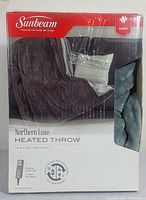 Front of the Sunbeam Northern Luxe Heated Throw box showing the blanket and branding.