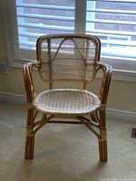 Full view of bamboo chair showing design and condition.