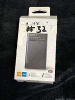 Photo of Sony portable pocket radio in original packaging showing front of radio.