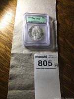 Hard plastic slab front showing ICG label and coin obverse