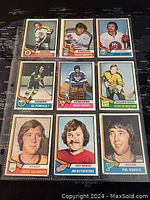 Front view of all 9 hockey cards showing players and team logos