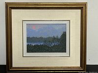 Framed artwork titled "Windermere Sun" by Philip Sybal showing the overall piece inside a gold-toned frame with linen matting.