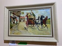 Full view of framed oil painting showing a street scene with horse-drawn carriage and villagers.