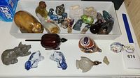Tray of mixed glass, ceramic and metal animal figurines