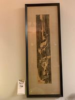 Full view of framed etching with artist stamp and signature visible