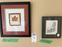 Photo of the lot showing both framed artworks side by side on a wall with measurement tape below each artwork.