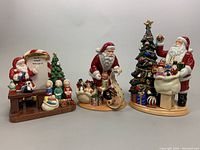 Front view of all three figurines side by side