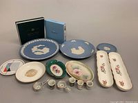 Full lot overview showing Minton, Wedgwood pieces, and other assorted dishes and miniatures.