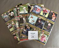 Full display of multiple 1990 Pro Set PGA Tour Special golf cards in protective binder pages showing various players and card design.