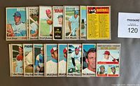 Photo showing 13 baseball cards from various players including David Dupage, Don Lock, Jim Lyttle, Rich Morales, and the Batting Leader card of Clemente and Rose.