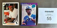 Close-up photo of Ken Griffey Jr. rated rookie and Frank Thomas rookie cards with identification card