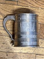 Side view showing handle and banded decoration