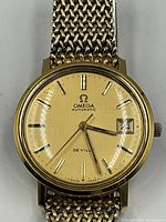 Front view of watch face and bracelet laid flat