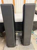 Front view of pair of speakers with grilles installed