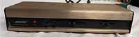 Front view of vintage Bose 901 Series V Active Equalizer showing all controls and power LED lit.