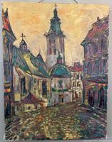 Full view of the oil painting showing the entire canvas with a European street scene featuring a church tower and surrounding buildings, signed by the artist.
