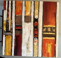 Full view of the abstract painting showing vertical blocks of warm colors with texture and mixed media elements.