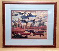 Full frontal image of framed vintage abstract landscape print on beige background showing frame, matting, and artwork details.