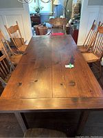 Top-down frontal view of full tabletop and chairs