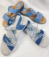 Both pairs of sandals shown together, Soft Comfort blue suede slip-ons and Skechers strappy sandals