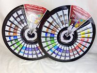 Two sealed packages of acrylic paint tubes displayed circularly showing full set of 24 colors each.
