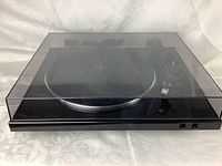 Front view of turntable with dust cover closed