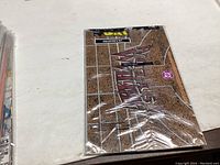 Sealed Shadow Of Bat comic collector's set with brown cracked wall design