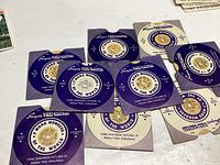 Ten assorted USA View-Master reels laid out on a white surface showing their paper labels with titles and branding.