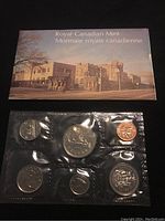 Original 1977 Royal Canadian Mint packaging with six sealed coins visible in a plastic holder.