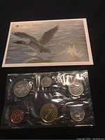 Photo of the front of the 1988 Canadian uncirculated coin set featuring coins in sealed packaging and a nature-themed card