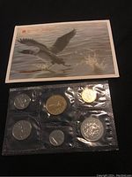 Original packaging of 1993 uncirculated Canadian coins showing 6 coins in sealed plastic with wildlife artwork insert card.
