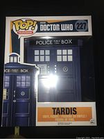 Front view of sealed Funko Pop box showing the TARDIS figure inside, labeled Doctor Who #227