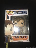 Front view of Funko Pop Television Doctor Who Tenth Doctor figure packaging showing figure inside box labeled number 221.