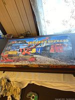 Closed box of President's Choice Insider's Express toy train set showing cover art with train and branding.