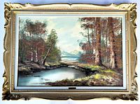 Full view of the framed oil painting showing the autumn landscape with the moat or pond and trees, within the ornate vintage wood frame.