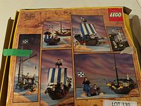 Box art showing multiple views of assembled Black Seas Barracuda ship
