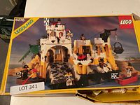 Front of LEGO set 6276 box showing assembled Island Outpost model and lot sticker