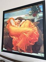 Full front view of the framed canvas painting showing the woman sleeping in an orange dress, with details of the background visible.