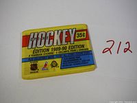 Front of 1989-90 O-Pee-Chee hockey wax pack showing colorful vintage packaging with price and edition details.