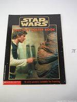 Front cover of the Vintage Star Wars pull-out poster book featuring Hans Solo and a Gamorrean guard.