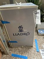 Original Lladro box showing branding and city Valencia Spain on the bottom.