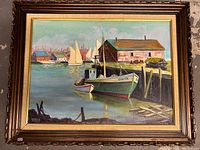 Full frontal view of framed oil painting depicting the harbor scene