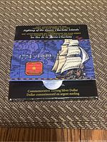 Blue and black box packaging with historic sailing ship and map art, labeled for the 225th anniversary of Juan Perez's sighting of the Queen Charlotte Islands, dated 1774-1999.
