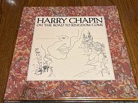 Box set album 'On the Road to Kingdom Come' by Harry Chapin with illustrated cover showing a face, castle, and street scene.