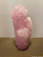 Front view of pink quartz cluster showing crystal terminations