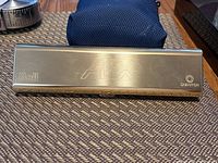 Metal outer case with Bell Atlantic ALEX and Sheaffer engravings