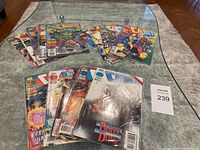 Photo showing 15 Marvel Comics featuring Cable character laid out on table with visible cover art.