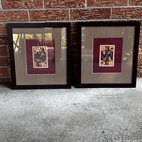 Two framed wall art pieces with King and Queen playing card images side by side.