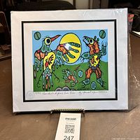 Frontal view of the Norval Morrisseau limited edition print titled 'Thunderbird Faces Cave Bear' showing the entire artwork and framing.